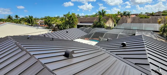 Standing-seam metal roof panels on a South Florida home